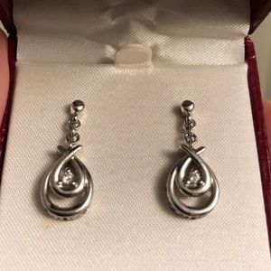 White gold diamond earrings.